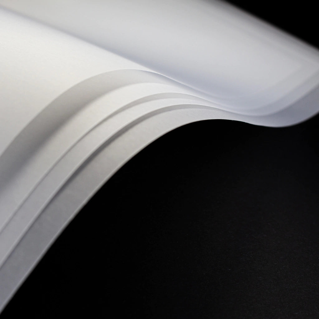 131113-001 📄 Papel Pergamino 115 g – Bolsa 18 (10 Hojas) - 24074