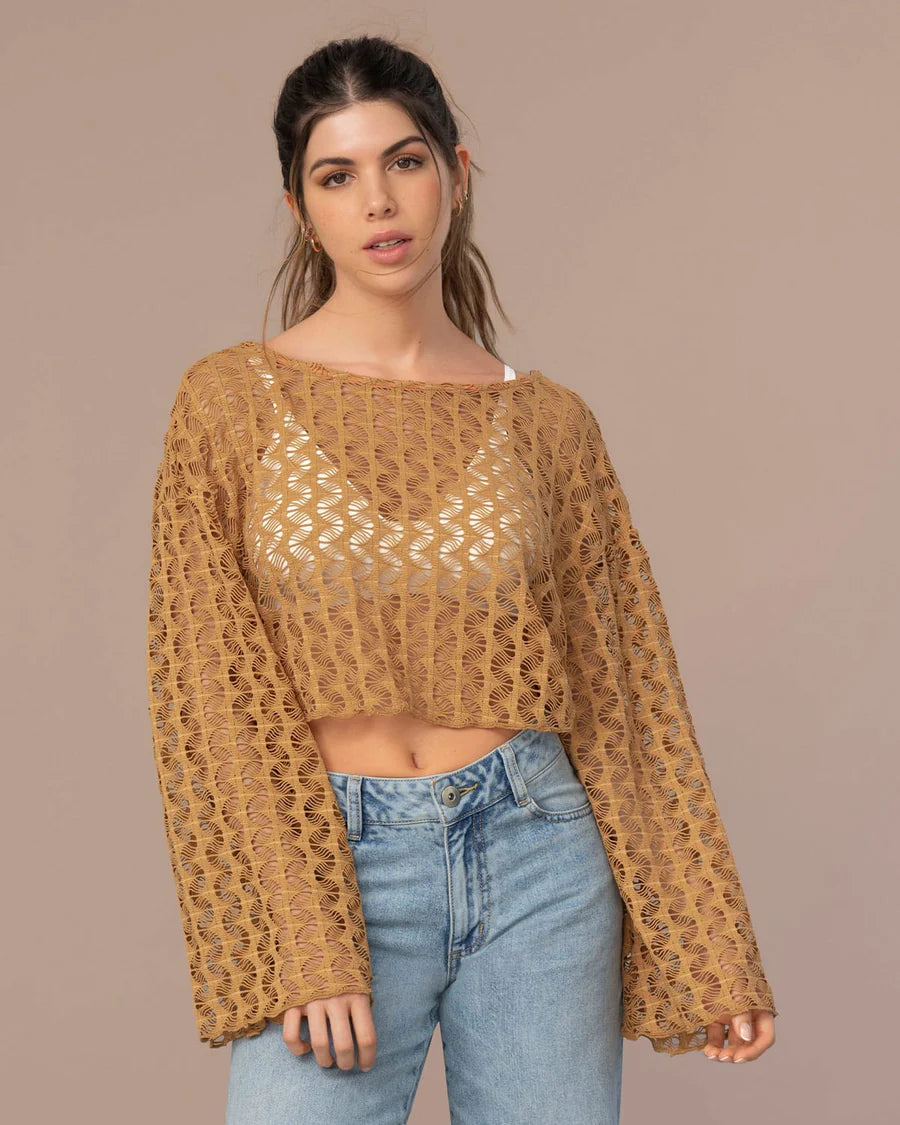 Camiseta crop manga larga con transparencias